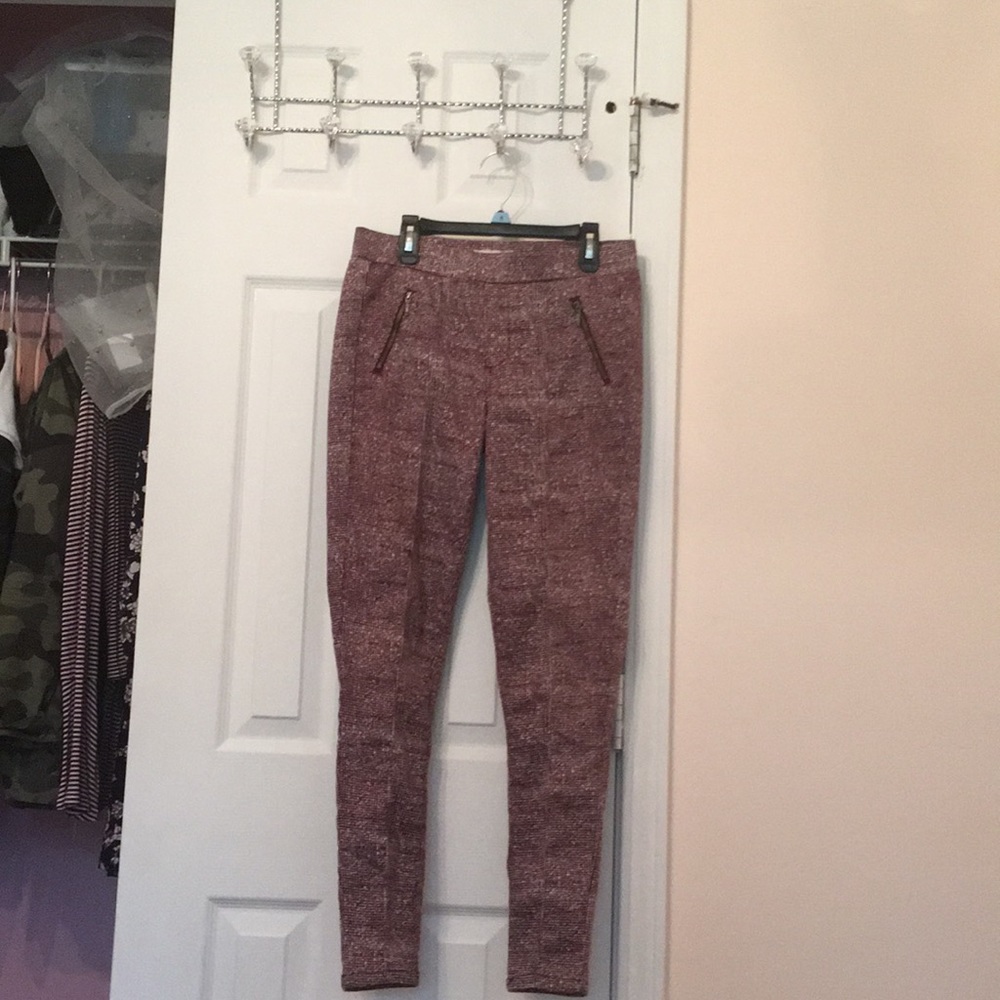 Burgundy tights with cute pocket zips.